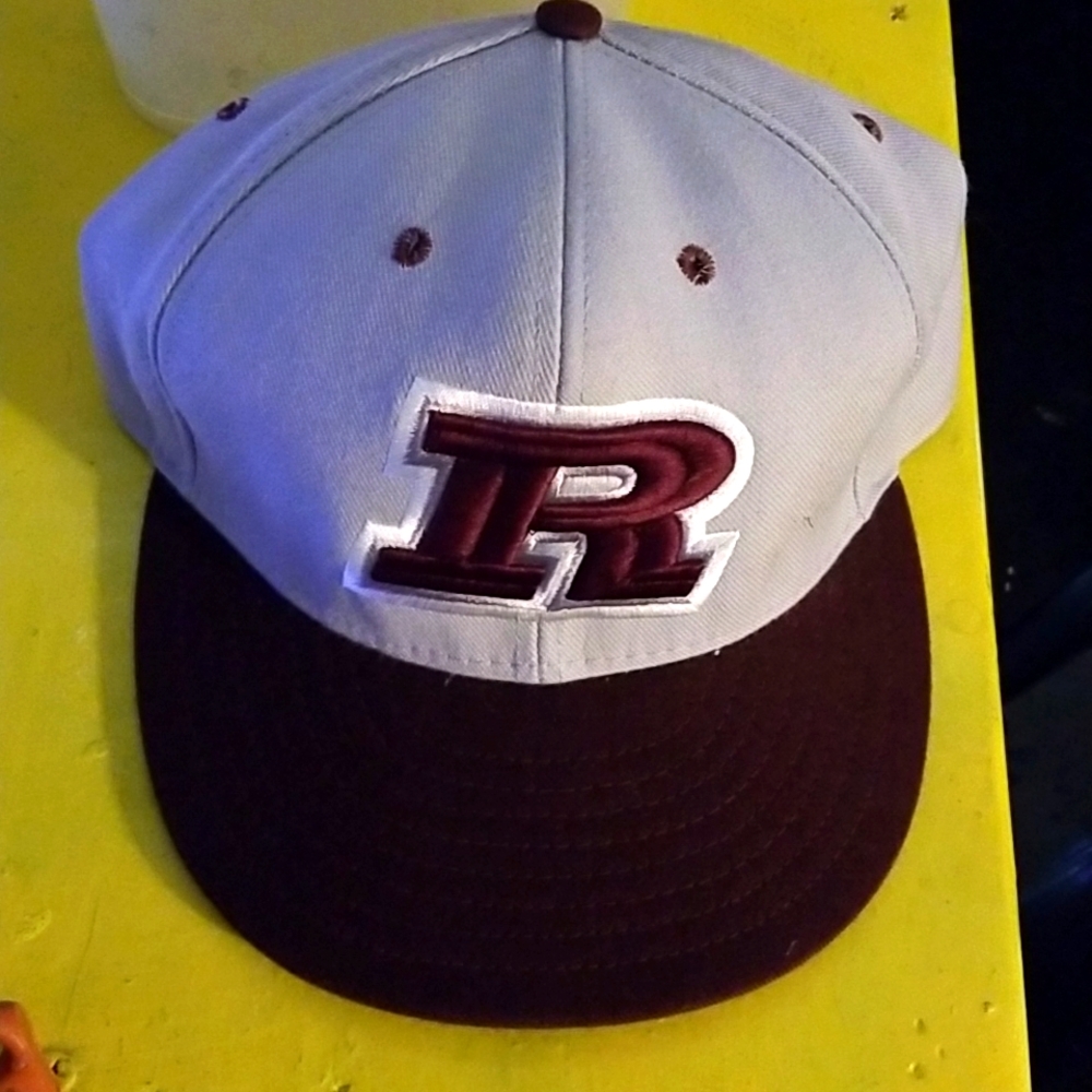 On the field baseball cap with letter "R"
